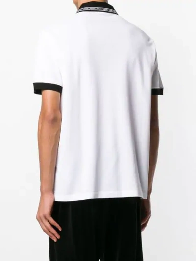 Shop Versace Logo Collar Polo Shirt In White