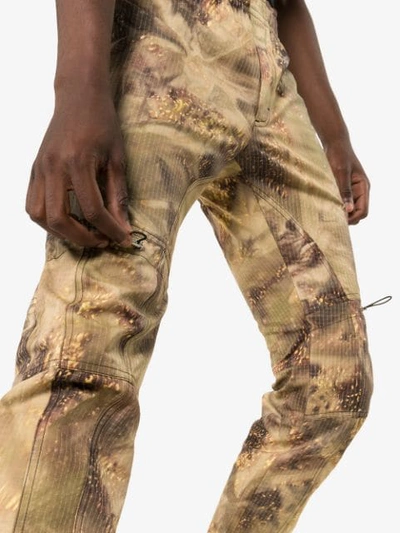 Shop Alyx Gaiter Camouflage Print Trousers In Green