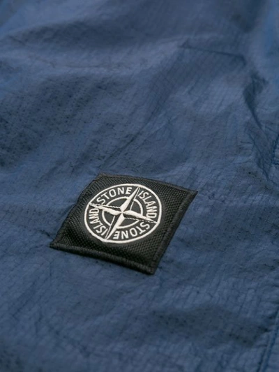 Shop Stone Island Logo Patch Track Trousers In Blue