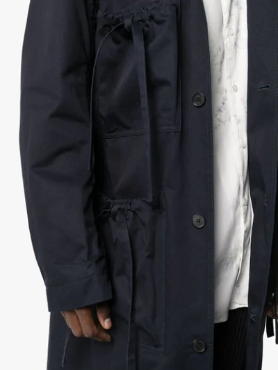 Shop Jw Anderson Multi-pocket Mid-length Overcoat In Blue