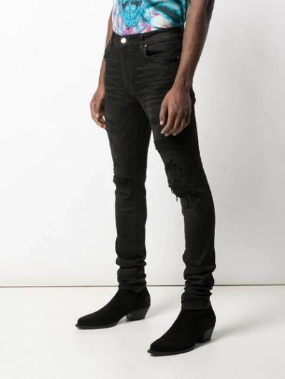 Shop Amiri Patch Jeans In Rough Black