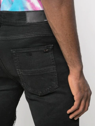 Shop Amiri Patch Jeans In Rough Black