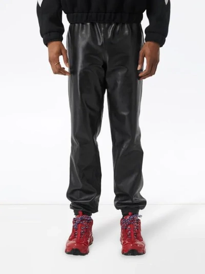 Shop Burberry Leather Track Pants In Black