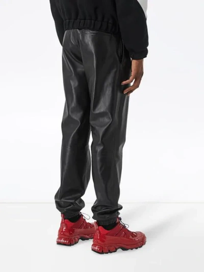 Shop Burberry Leather Track Pants In Black