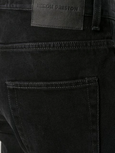 Shop Heron Preston Contrast Button Jeans In Black