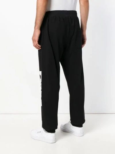 Shop Perks And Mini Logo Print Jog Track Pants In Black