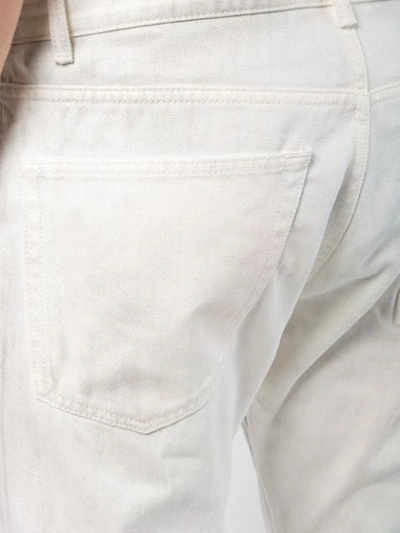 Shop John Elliott Frayed Edges Cropped Jeans In White