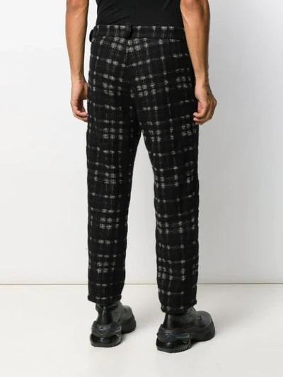 Shop Ann Demeulemeester Check Print Trousers In Black