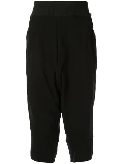 Shop Julius Cropped Drop-crotch Trousers In Black