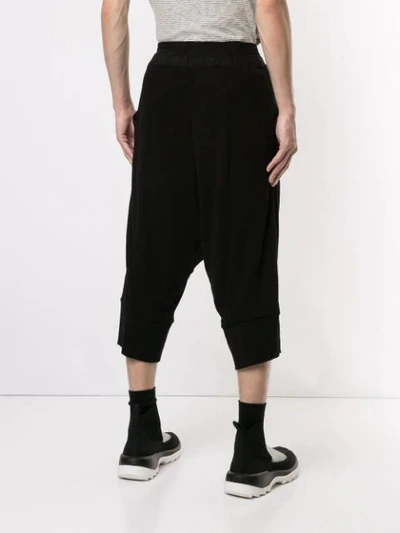 Shop Julius Cropped Drop-crotch Trousers In Black