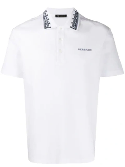Shop Versace Contrasting Embroidery Polo Shirt In White
