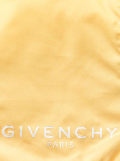 Shop Givenchy Logo Print Swim Shorts In Yellow