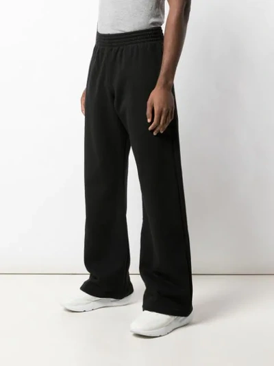 Shop Martine Rose Plain Wide-leg Trousers In Black