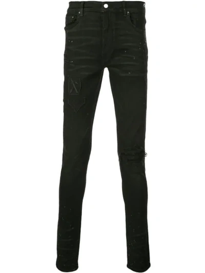 Shop Amiri Painter Military Patches Skinny Jeans In Rough Black