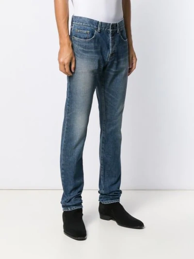 Shop Saint Laurent Stonewashed Straight-leg Jeans In Blue