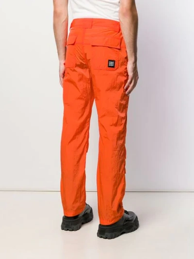 Shop Msgm Fluorescent Cargo Trousers In Orange