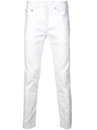 Shop Neil Barrett Super Slim-fit Jeans In White