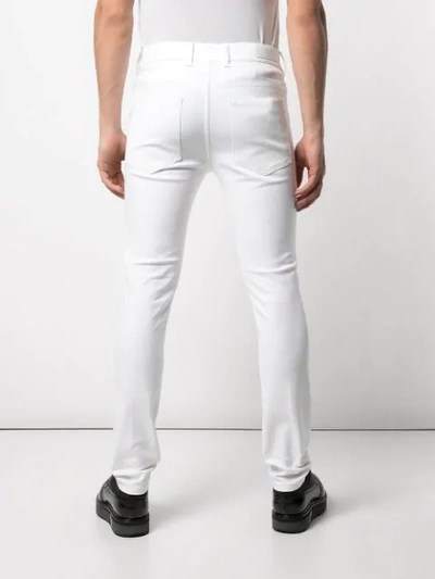 Shop Neil Barrett Super Slim-fit Jeans In White