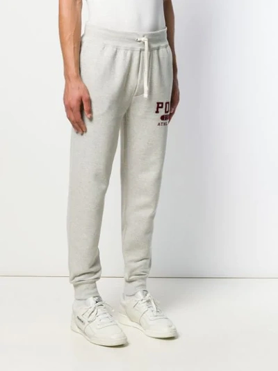 Shop Polo Ralph Lauren Printed Logo Track Pants In Grey