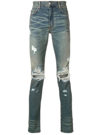 Shop Amiri Ripped Skinny Jeans In Blue