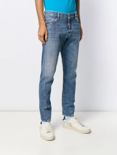 Shop Dsquared2 Logo Patch Tapered Jeans In Blue