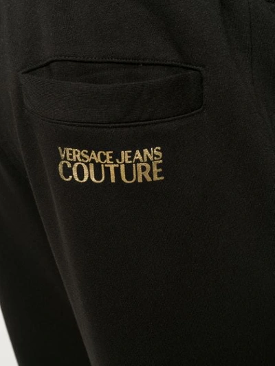 Shop Versace Drawstring Waist Track Pants In Black