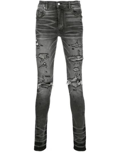 Shop Amiri Distressed Skinny Jeans In Black