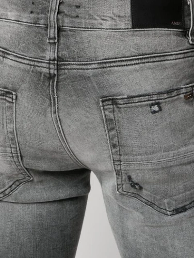 Amiri Distressed Skinny Jeans In Black
