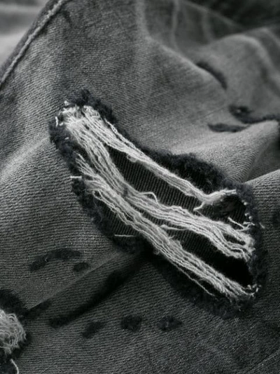 Amiri Distressed Skinny Jeans In Black