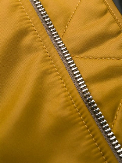 Shop Acne Studios Bomber Jacket In Yellow
