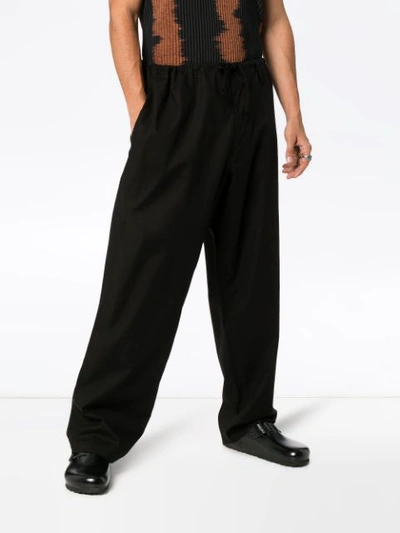 Shop Yohji Yamamoto Black Wide-leg Drawstring Trousers