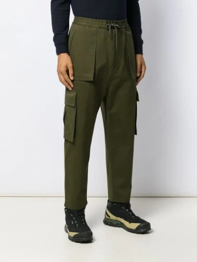 Shop Juunj Utility Track Pants In Green