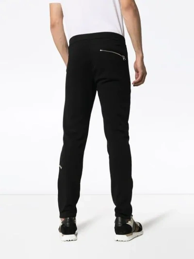 Shop Alexander Mcqueen Zip Cuff Cotton Track Pants In Black