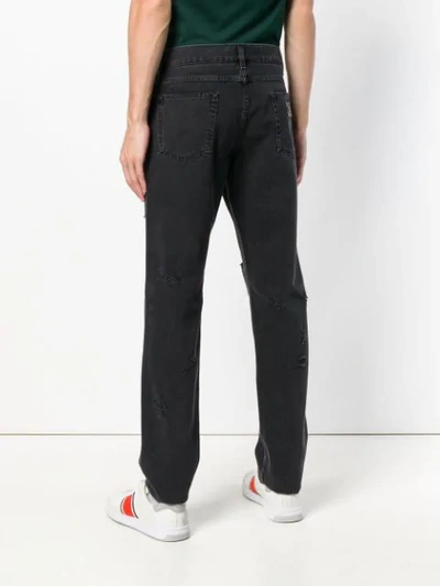 Shop Dolce & Gabbana Distressed Jeans - Black