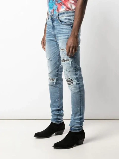Shop Amiri Music Note Patch Jeans In Medium Crafted Indigo