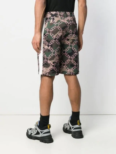 Shop Valentino Logo Grid Camouflage Print Shorts In Green