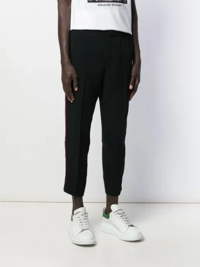 Shop Alexander Mcqueen Contrast Piping Straight-leg Trousers In Black