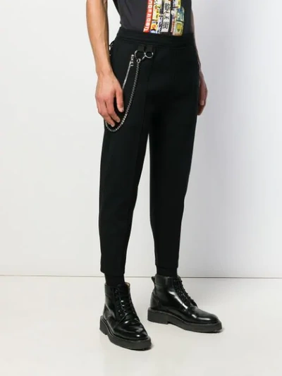 Shop Neil Barrett Chain Strap Tapered Trousers In Black