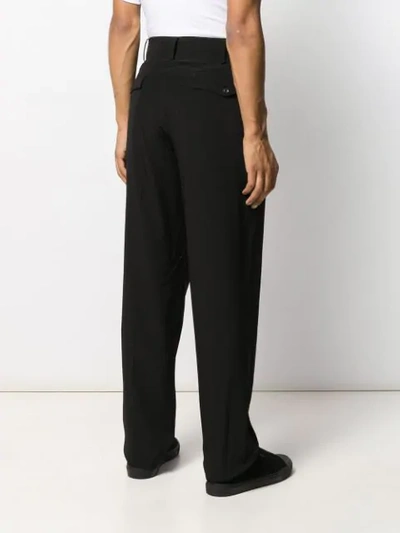 Shop Yohji Yamamoto Pleated Tailored Trousers In Black