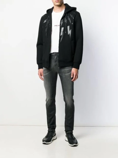 Shop Neil Barrett Faded Slim-fit Jeans In Black