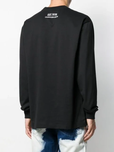 Shop Calvin Klein Jeans Est.1978 Man On The Moon Sweatshirt In Black