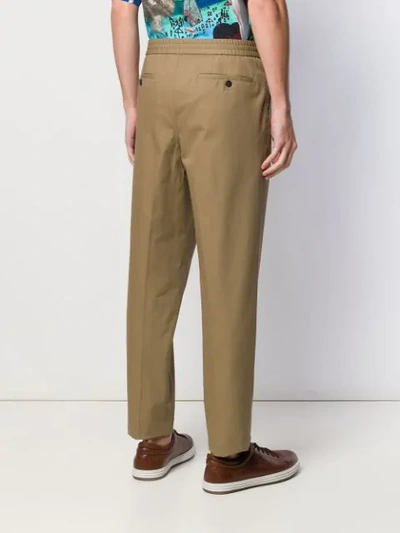 Shop Ferragamo Tapered Trousers In Neutrals