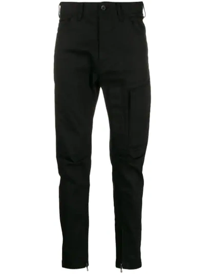 Shop Julius Zip Detailed Trousers In Black