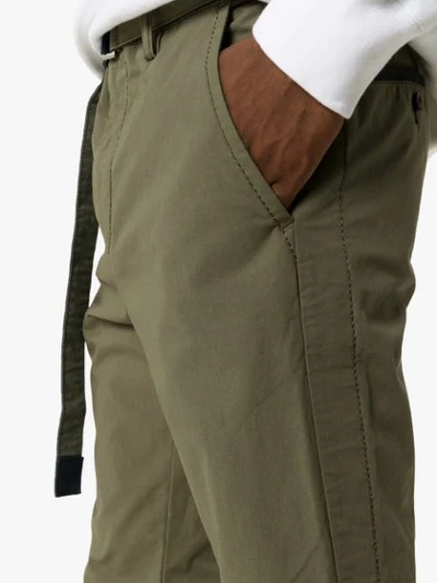Shop Sacai Oxford Straight-leg Trousers In Green
