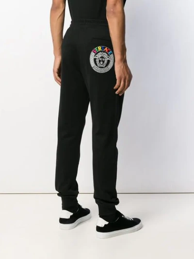 Shop Versace Medusa Print Tack Trousers In Black