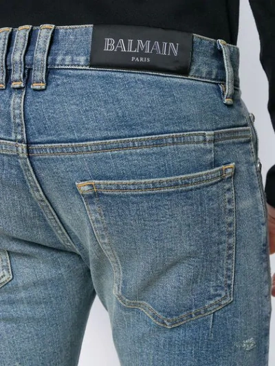 Shop Balmain Ripped Skinny Fit Denim Jeans In Blue
