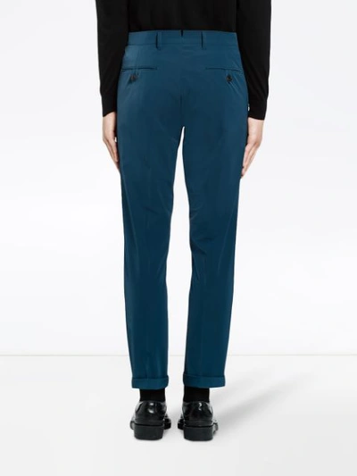 Shop Prada Light Stretch Techno Fabric Trousers In Blau