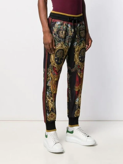 Shop Dolce & Gabbana Heraldic Print Track Pants In Black