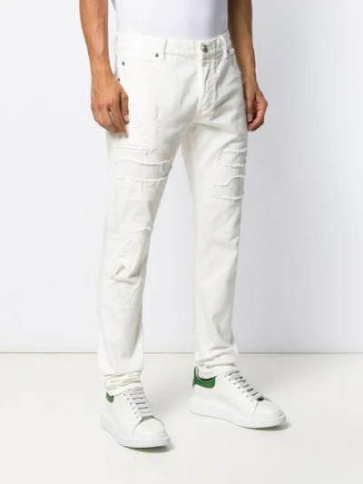 Shop Balmain Distressed Slim-fit Jeans In White