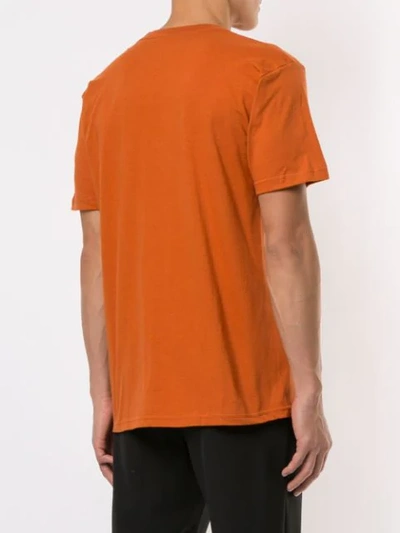 Shop Supreme Riders T-shirt In Orange